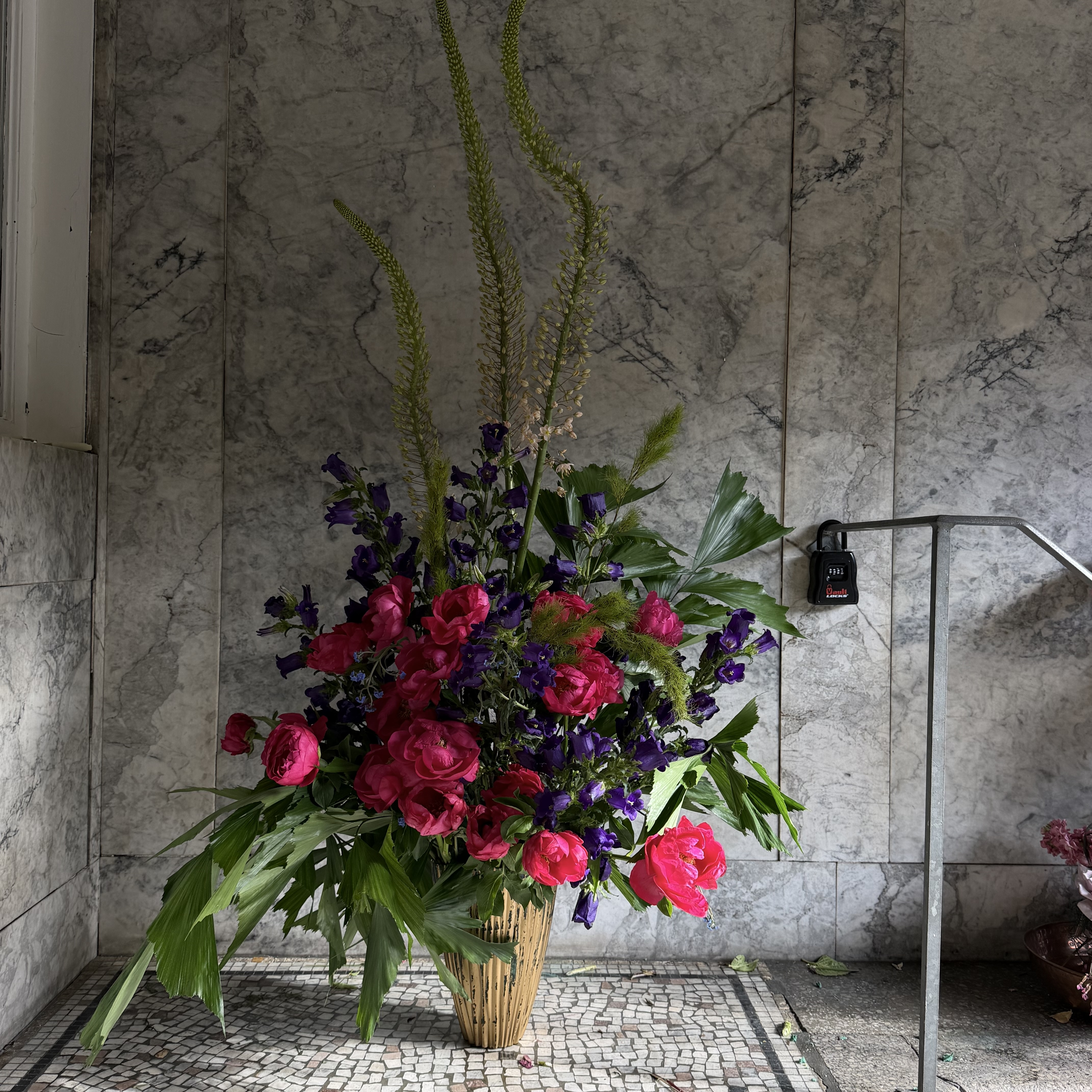 Amnesia roses, hydrangea and stock in gold urn