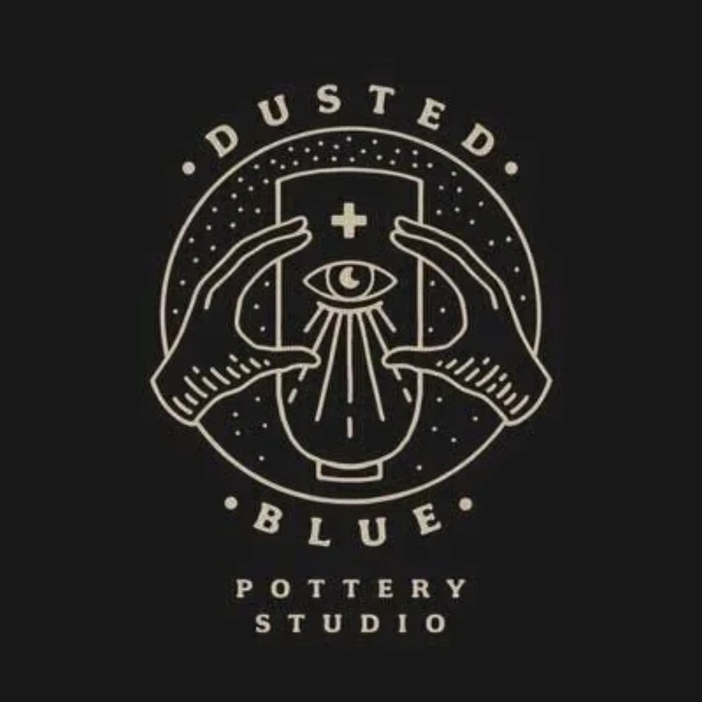 Dusted and Blue Pottery Studio logo — fine-line cream illustration of two hands cradling a vase with a single open eye, ringed by the wordmark DUSTED · BLUE and POTTERY STUDIO on a black ground.