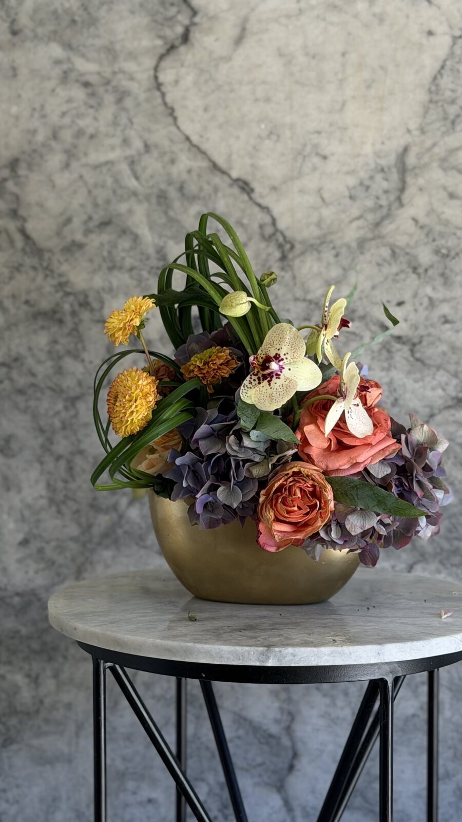 Sculptural seasonal flowers arranged by Lovely Coven