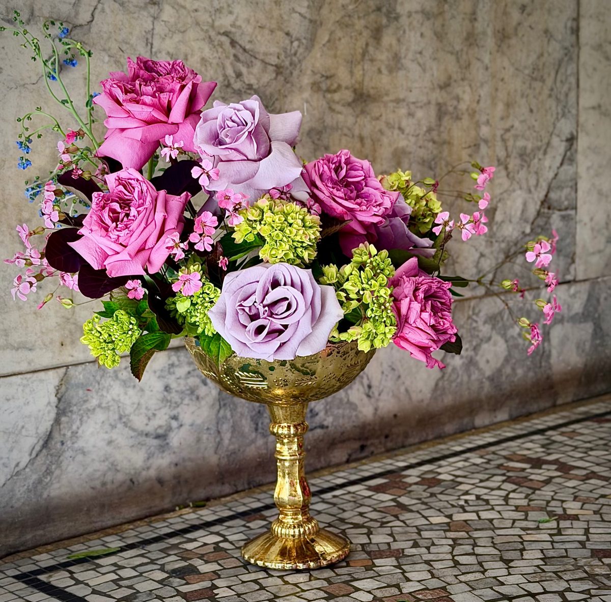 Example of The Familiar — pink and lavender roses in a gold chalice